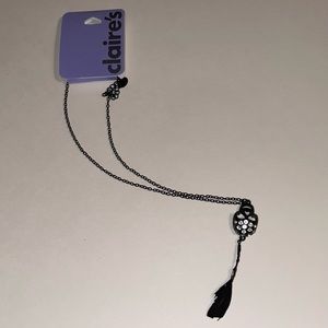 Claire’s Rhinestone Black Skull & Feather Necklace